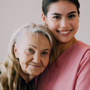 woman hug elderly woman