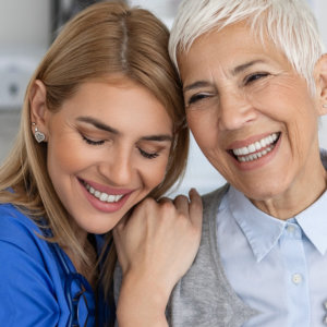 woman hug elderly woman