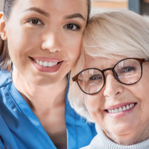 woman and elderly woman wearing glasses