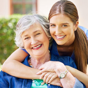 woman hug elderly woman