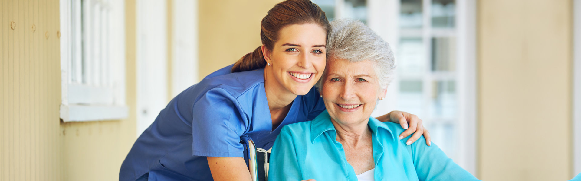 two woman smiling