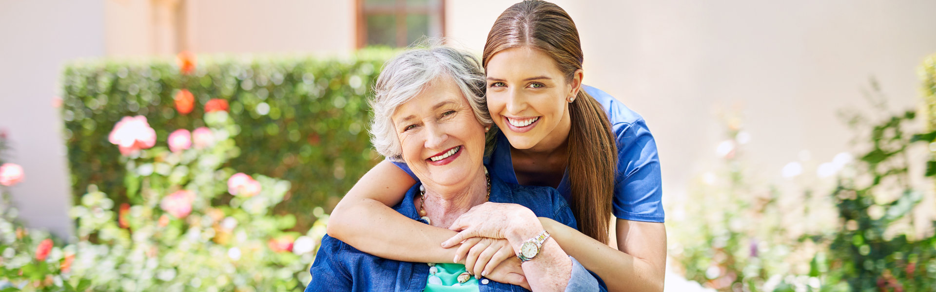 woman hug elderly woman